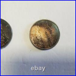 1 oz Silver Coins x 8 withHeavy Toning Libertad, Silver Eagle, Maple Leaf Britania